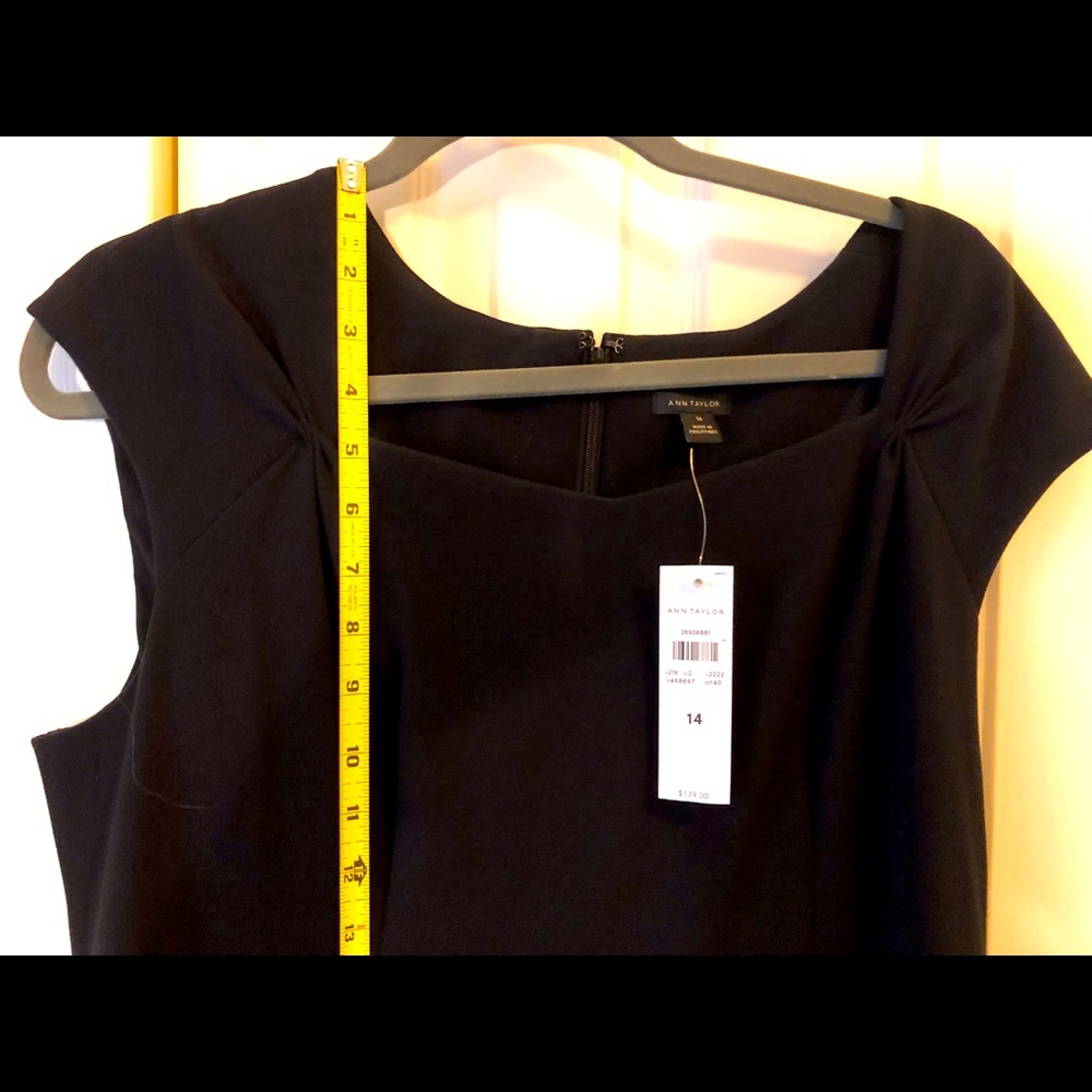 Ann Taylor sized 14 work dress. This dress has a great flattering top.